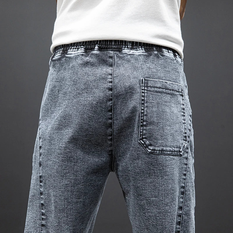 Primavera Verano negro azul Cargo Jeans hombres ropa de calle Denim Jogger pantalones hombres holgados Harem Jean pantalones de talla grande
