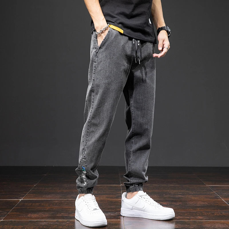 Primavera Verano negro azul Cargo Jeans hombres ropa de calle Denim Jogger pantalones hombres holgados Harem Jean pantalones de talla grande