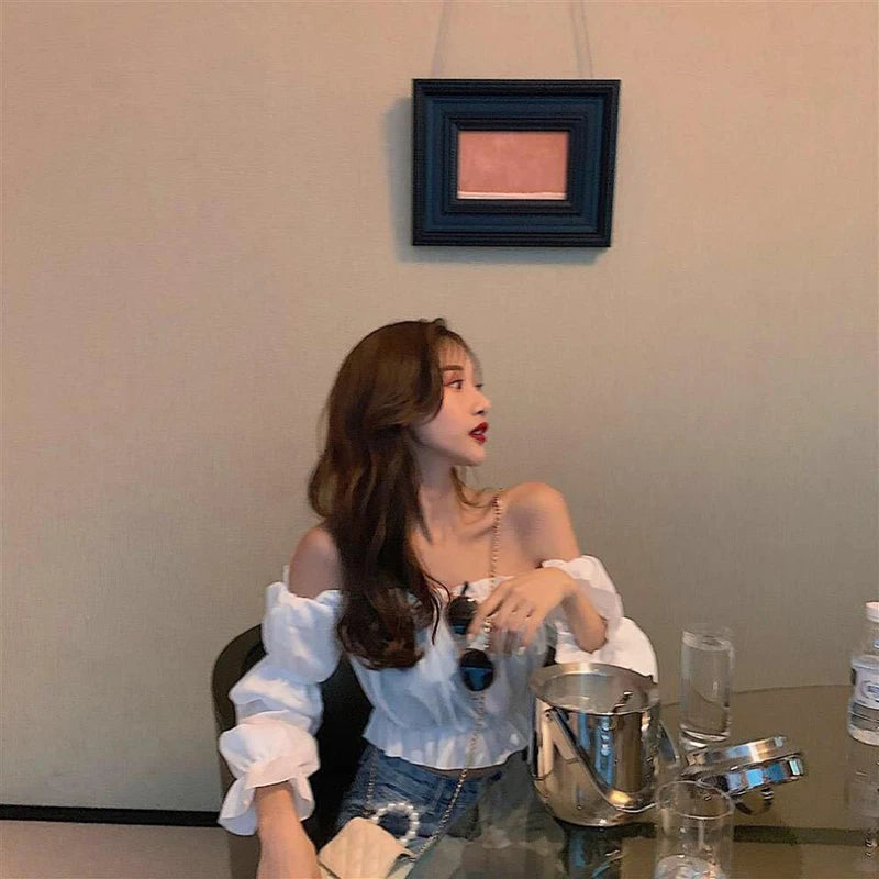 Top Sexy para mujer, blusa con hombros descubiertos, Top de manga larga de Color sólido, camisa blanca, manga abombada, Túnica con volantes, Top corto de tubo de verano