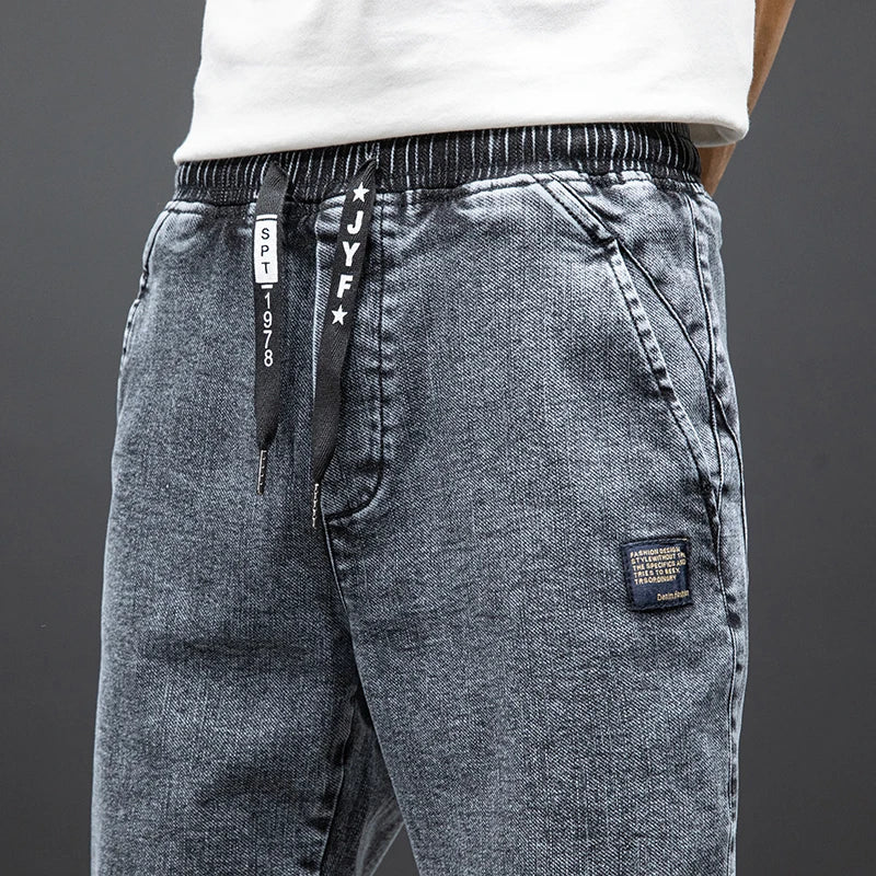 Primavera Verano negro azul Cargo Jeans hombres ropa de calle Denim Jogger pantalones hombres holgados Harem Jean pantalones de talla grande