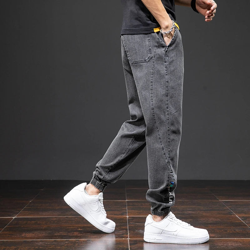 Primavera Verano negro azul Cargo Jeans hombres ropa de calle Denim Jogger pantalones hombres holgados Harem Jean pantalones de talla grande