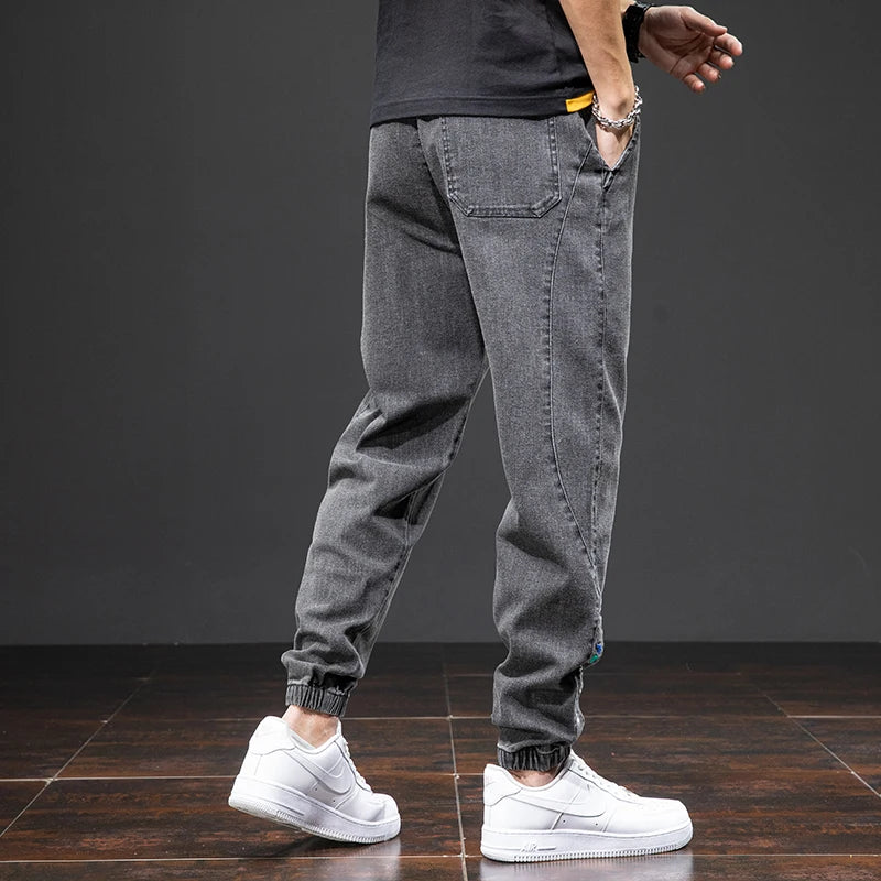 Primavera Verano negro azul Cargo Jeans hombres ropa de calle Denim Jogger pantalones hombres holgados Harem Jean pantalones de talla grande
