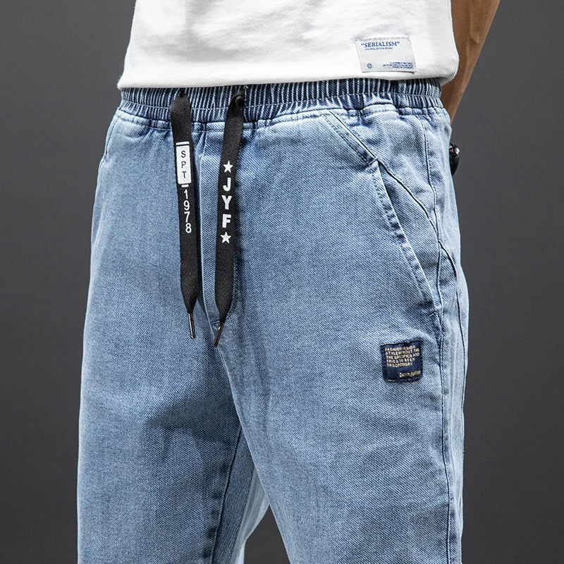Primavera Verano negro azul Cargo Jeans hombres ropa de calle Denim Jogger pantalones hombres holgados Harem Jean pantalones de talla grande