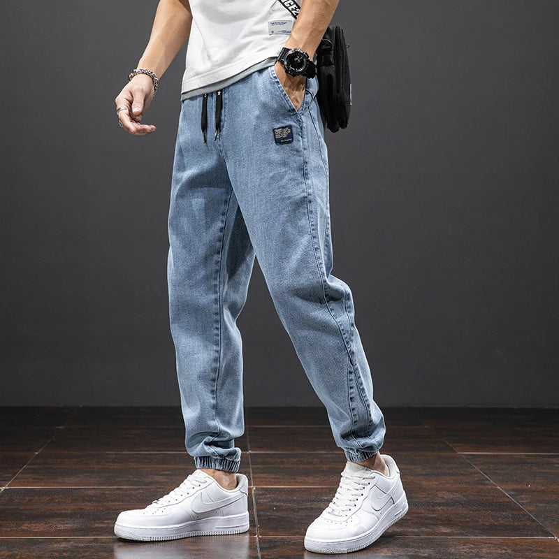 Primavera Verano negro azul Cargo Jeans hombres ropa de calle Denim Jogger pantalones hombres holgados Harem Jean pantalones de talla grande