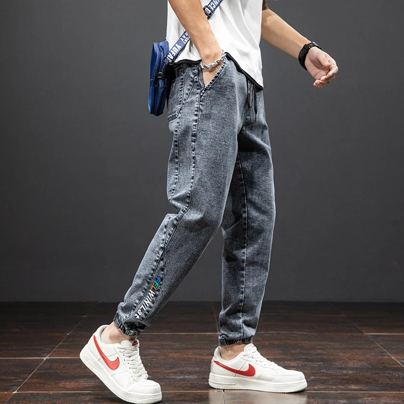 Primavera Verano negro azul Cargo Jeans hombres ropa de calle Denim Jogger pantalones hombres holgados Harem Jean pantalones de talla grande