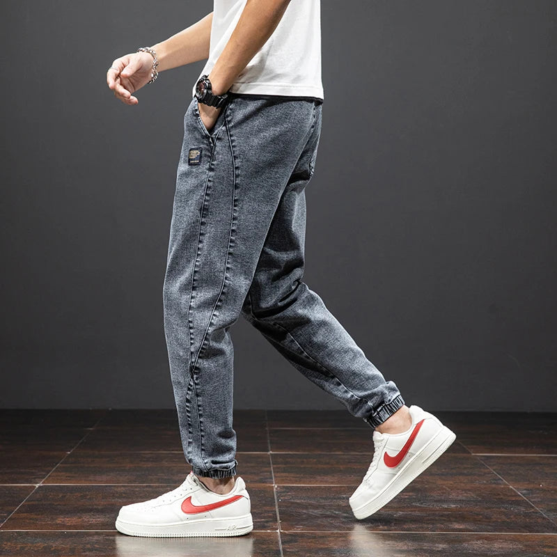 Primavera Verano negro azul Cargo Jeans hombres ropa de calle Denim Jogger pantalones hombres holgados Harem Jean pantalones de talla grande