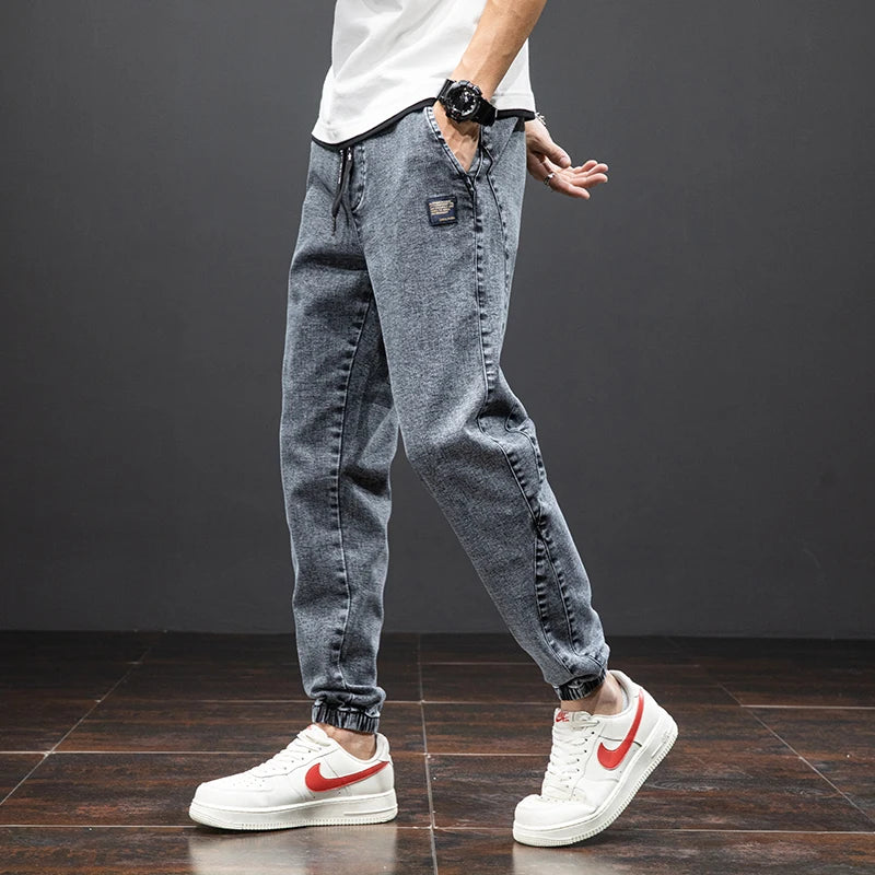 Primavera Verano negro azul Cargo Jeans hombres ropa de calle Denim Jogger pantalones hombres holgados Harem Jean pantalones de talla grande
