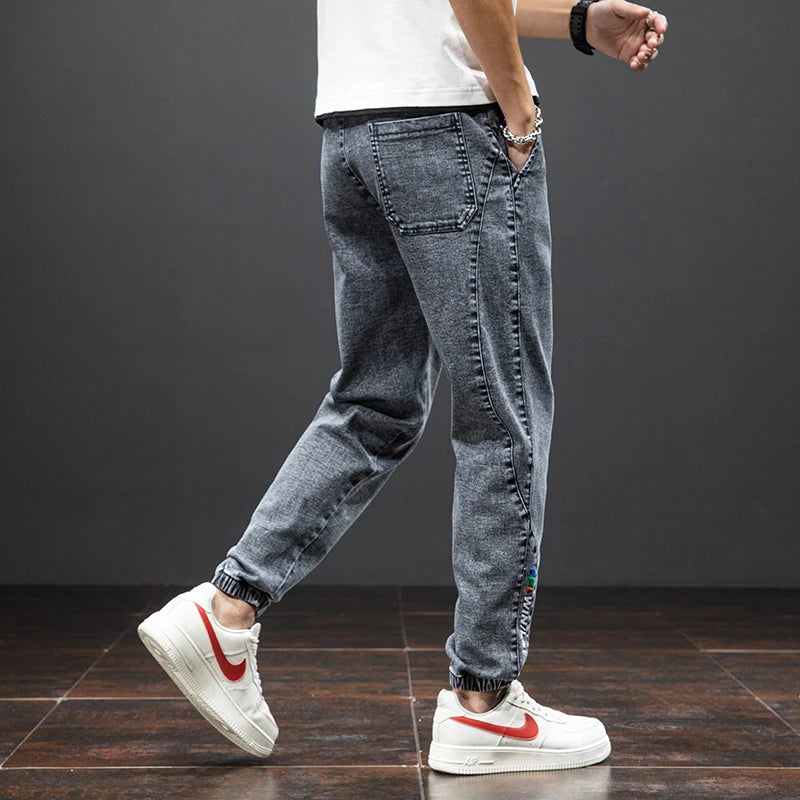 Primavera Verano negro azul Cargo Jeans hombres ropa de calle Denim Jogger pantalones hombres holgados Harem Jean pantalones de talla grande