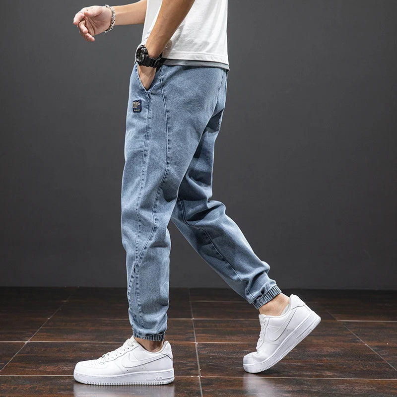 Primavera Verano negro azul Cargo Jeans hombres ropa de calle Denim Jogger pantalones hombres holgados Harem Jean pantalones de talla grande