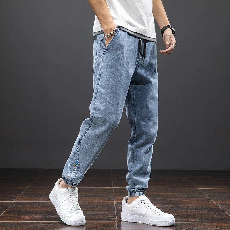 Primavera Verano negro azul Cargo Jeans hombres ropa de calle Denim Jogger pantalones hombres holgados Harem Jean pantalones de talla grande