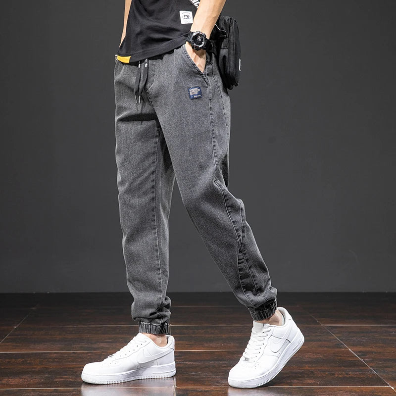 Primavera Verano negro azul Cargo Jeans hombres ropa de calle Denim Jogger pantalones hombres holgados Harem Jean pantalones de talla grande