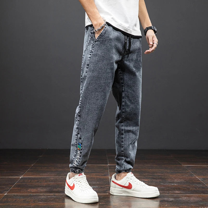 Primavera Verano negro azul Cargo Jeans hombres ropa de calle Denim Jogger pantalones hombres holgados Harem Jean pantalones de talla grande
