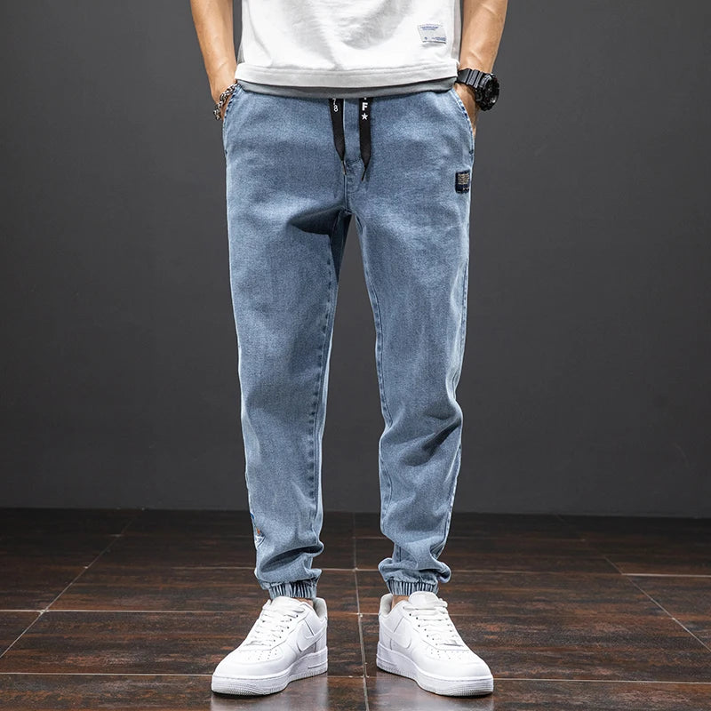 Primavera Verano negro azul Cargo Jeans hombres ropa de calle Denim Jogger pantalones hombres holgados Harem Jean pantalones de talla grande