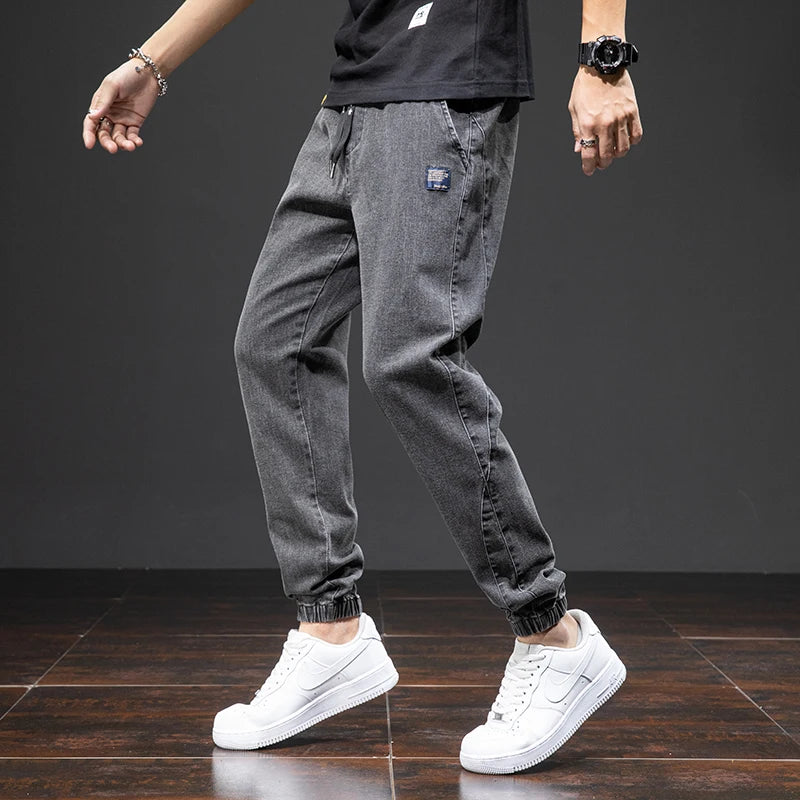 Primavera Verano negro azul Cargo Jeans hombres ropa de calle Denim Jogger pantalones hombres holgados Harem Jean pantalones de talla grande