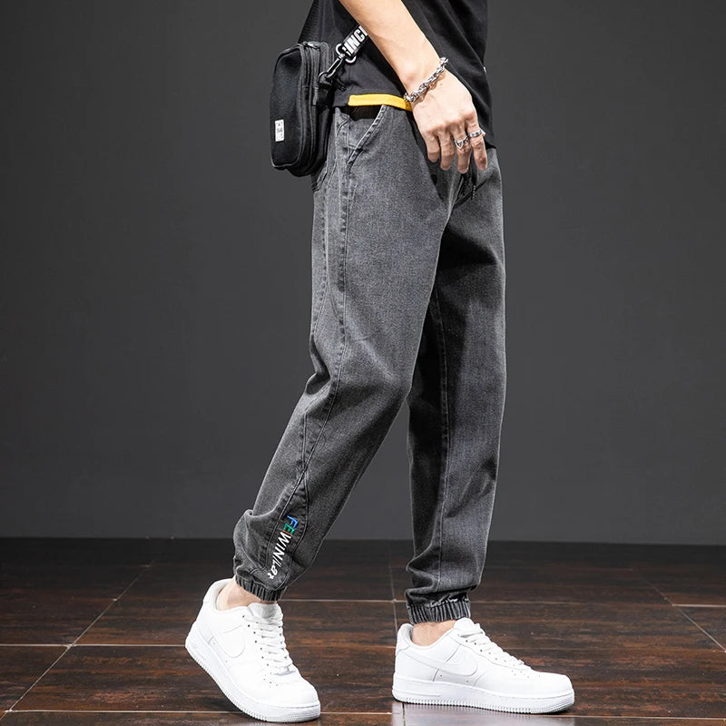 Primavera Verano negro azul Cargo Jeans hombres ropa de calle Denim Jogger pantalones hombres holgados Harem Jean pantalones de talla grande