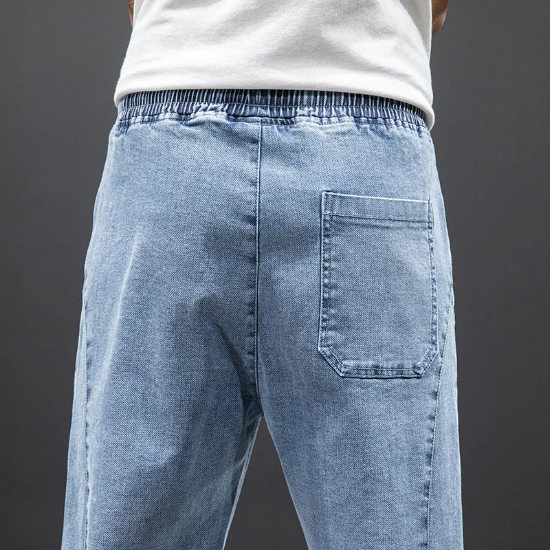 Primavera Verano negro azul Cargo Jeans hombres ropa de calle Denim Jogger pantalones hombres holgados Harem Jean pantalones de talla grande