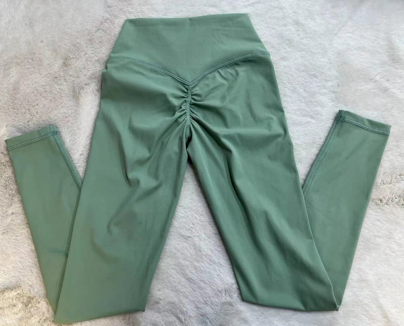 SHINBENE esculpir melocotón cintura alta V corte espalda gimnasio Fitness medias pantalones de Yoga ocultos Scrunch Butt deporte Leggings para mujeres