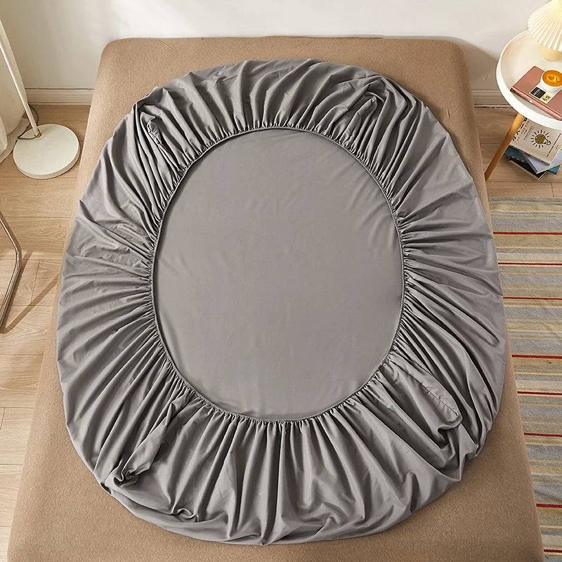 Sábana bajera 100% de algodón con banda elástica, funda de colchón ajustable antideslizante de Color sólido para camas individuales, dobles, King y Queen