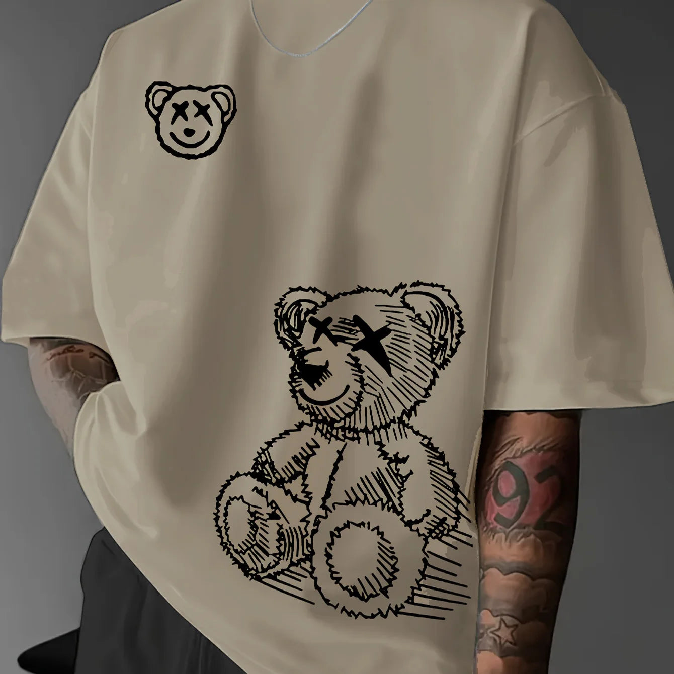 Camiseta deportiva informal de algodón puro 100% para hombre, camiseta holgada y a la moda con estampado de oso de dibujos animados, cuello redondo, manga corta, verano