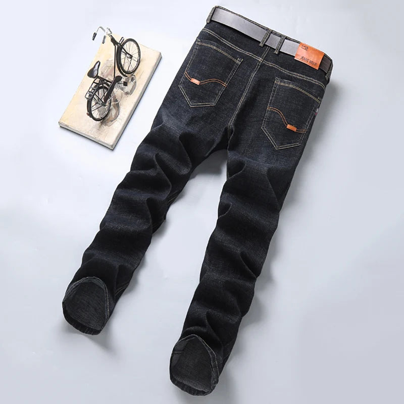 Nuevos pantalones ligeros de lujo elásticos ajustados para hombre, cómodos y suaves pantalones vaqueros informales rectos a la moda de negocios, ropa de marca masculina