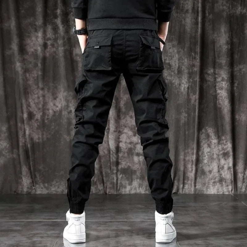 Pantalones Cargo de moda para hombre, pantalones ajustados de estilo informal, holgados, estilo americano, pantalones de pie pequeños con múltiples bolsillos, color negro, primavera y otoño