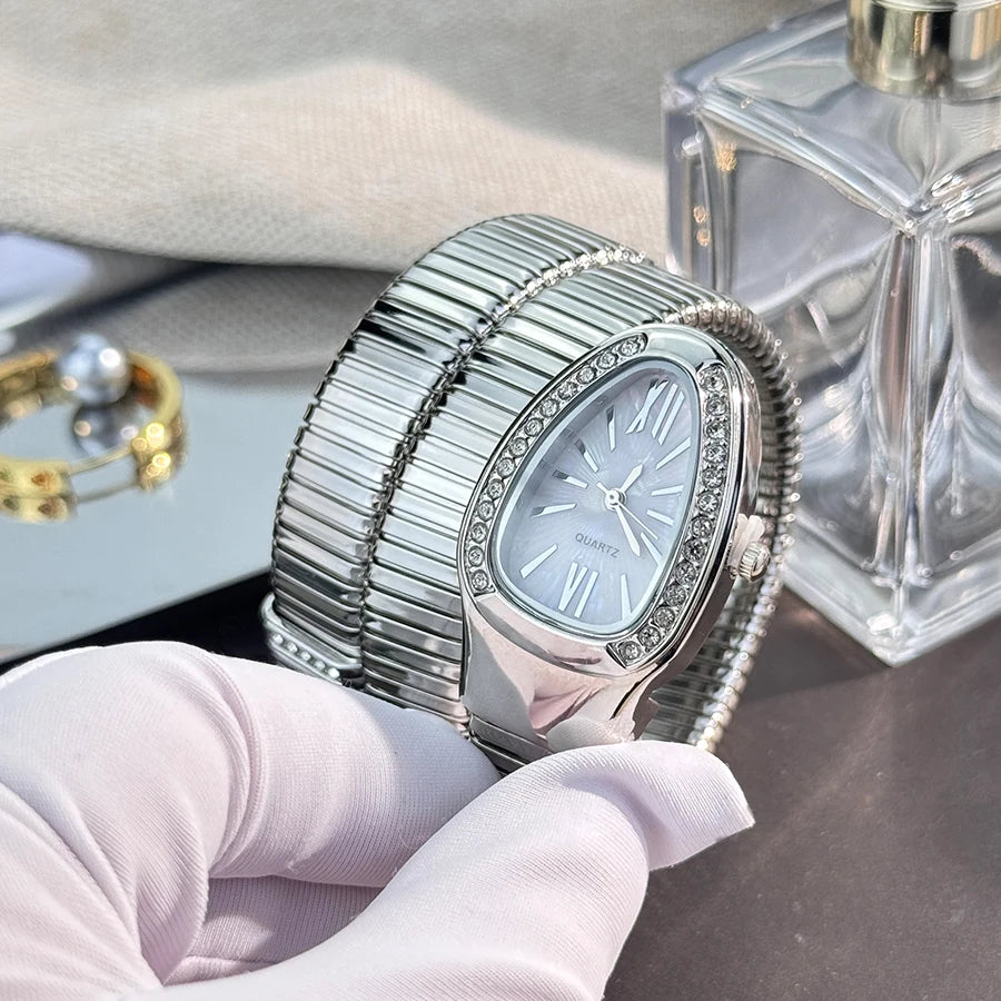 Reloj de aleación serpentina de alta calidad a la moda para mujer con caja de diamantes Reloj de pulsera de cuarzo de alta calidad estilo famoso