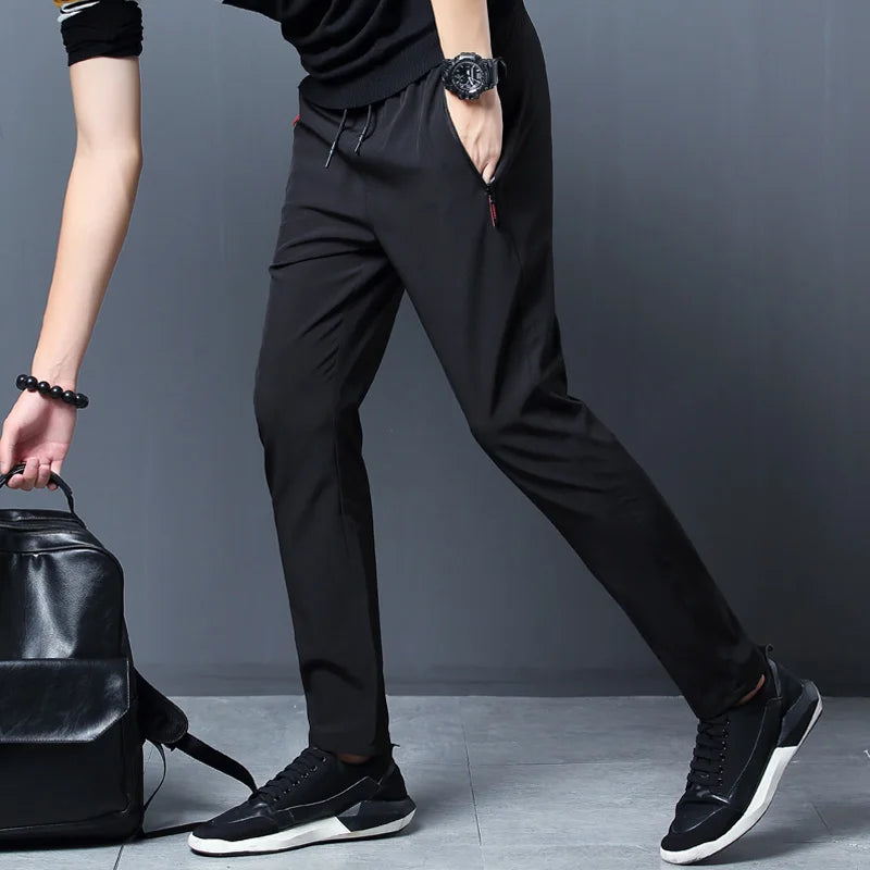 Pantalones casuales de secado rápido de seda de hielo de verano para hombres pantalones ajustados versión coreana pantalones de seda de hielo pantalones deportivos tubo recto de secado rápido p