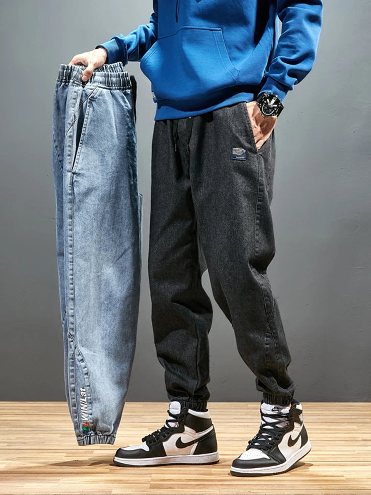 Pantalones vaqueros para correr de talla grande para hombre, ropa de calle 6XL 7XL 8XL, pantalones Cargo de mezclilla informales en negro y azul, pantalones vaqueros cónicos de algodón elásticos, pantalones holgados