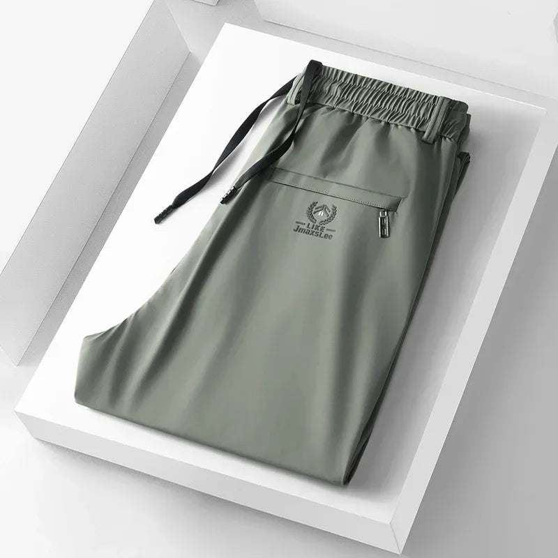 Pantalones informales finos de tela de seda de hielo suave para hombre, pantalón recto de estilo coreano, de alta elasticidad, marca de lujo, verano 2024