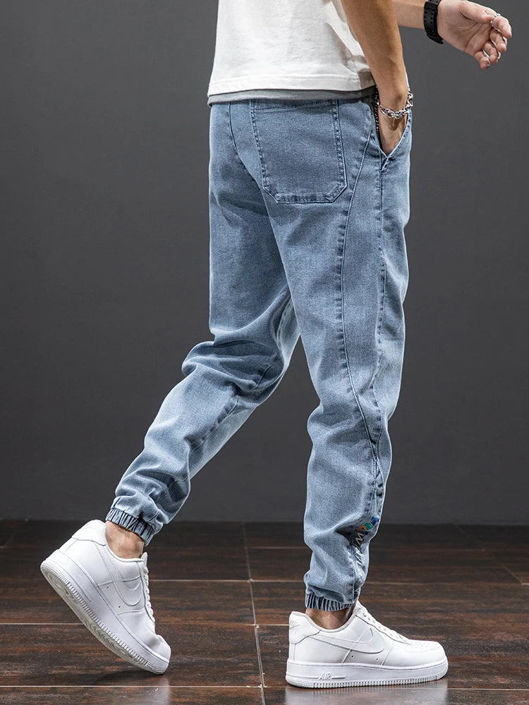 Primavera Verano negro azul Cargo Jeans hombres ropa de calle Denim Jogger pantalones hombres holgados Harem Jean pantalones de talla grande