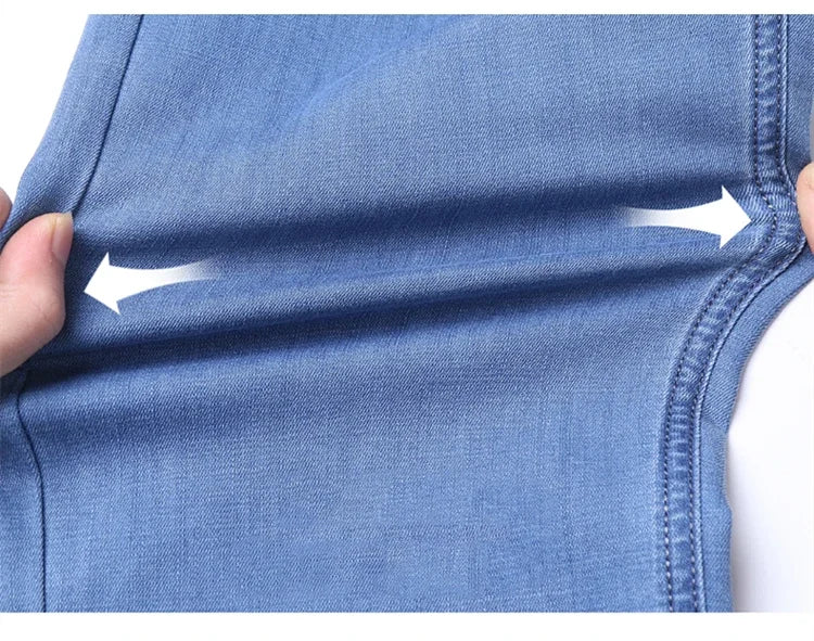 Nuevos pantalones vaqueros finos de seda de hielo para hombres, pantalones de algodón elásticos rectos azules, pantalones ligeros informales de negocios para primavera y verano