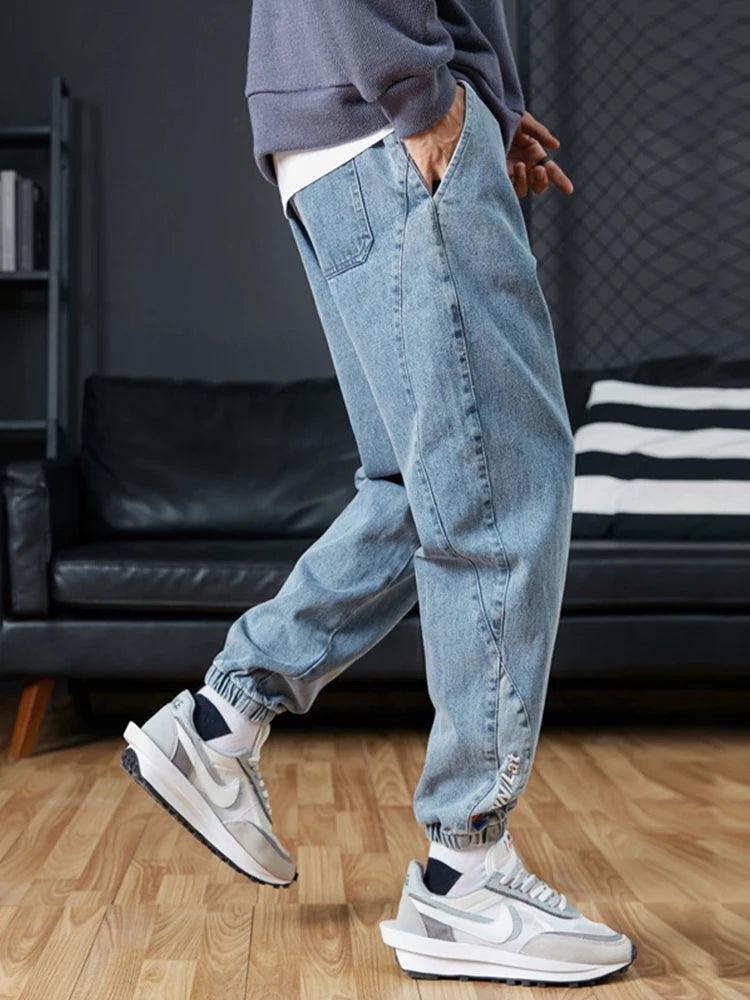 Pantalones vaqueros para correr de talla grande para hombre, ropa de calle 6XL 7XL 8XL, pantalones Cargo de mezclilla informales en negro y azul, pantalones vaqueros cónicos de algodón elásticos, pantalones holgados