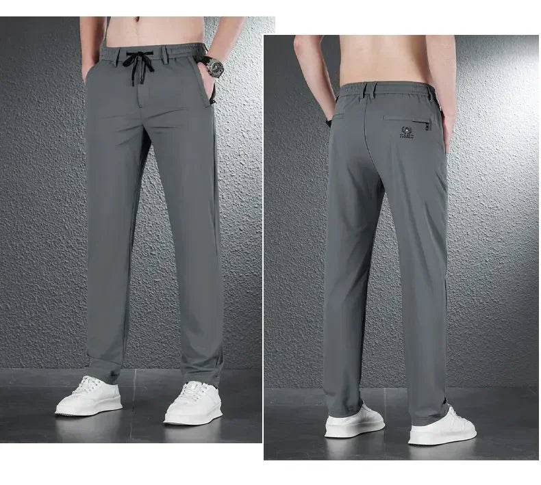 Pantalones informales finos de tela de seda de hielo suave para hombre, pantalón recto de estilo coreano, de alta elasticidad, marca de lujo, verano 2024