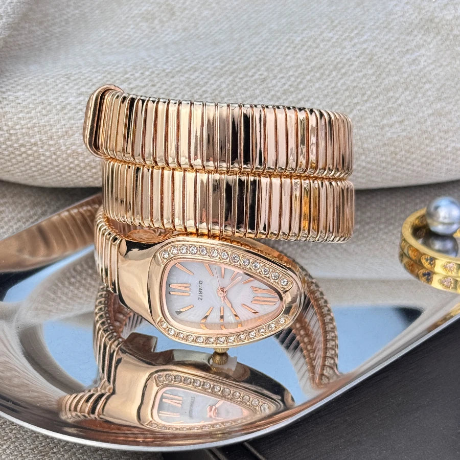 Reloj de aleación serpentina de alta calidad a la moda para mujer con caja de diamantes Reloj de pulsera de cuarzo de alta calidad estilo famoso