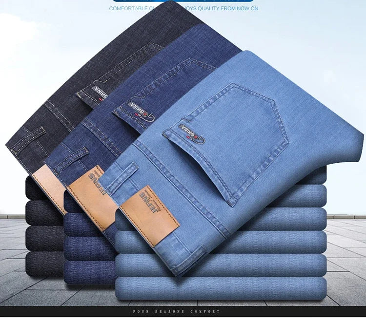 Nuevos pantalones vaqueros finos de seda de hielo para hombres, pantalones de algodón elásticos rectos azules, pantalones ligeros informales de negocios para primavera y verano