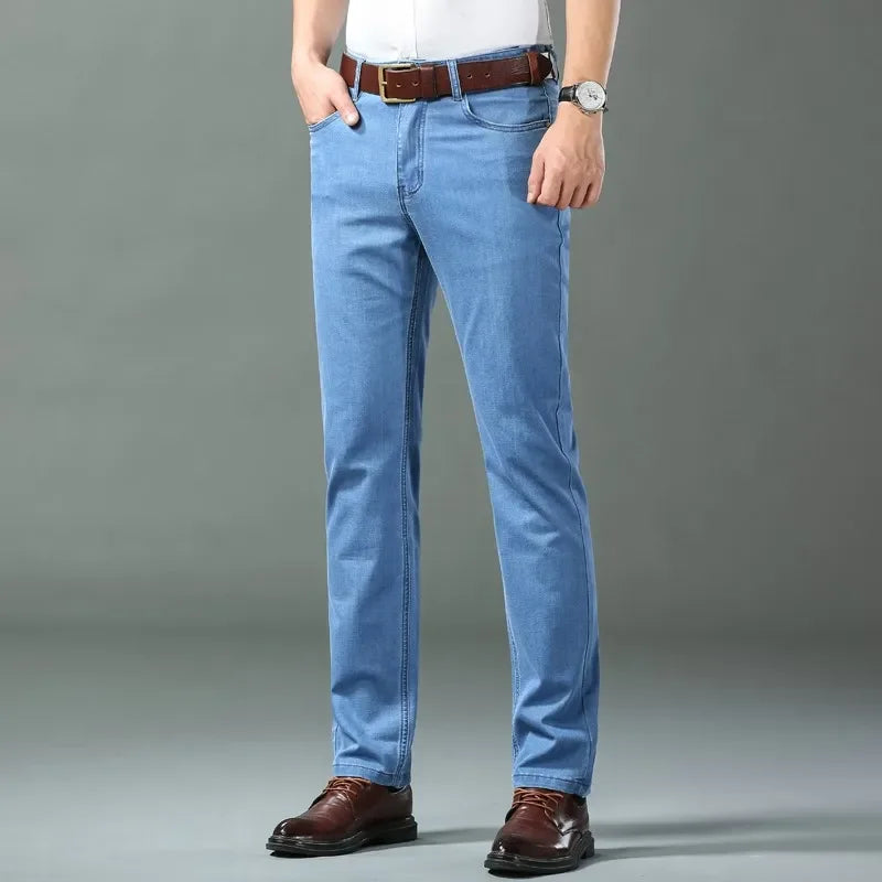 Nuevos pantalones vaqueros finos de seda de hielo para hombres, pantalones de algodón elásticos rectos azules, pantalones ligeros informales de negocios para primavera y verano