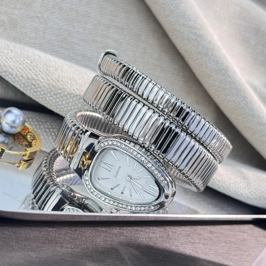 Reloj de aleación serpentina de alta calidad a la moda para mujer con caja de diamantes Reloj de pulsera de cuarzo de alta calidad estilo famoso