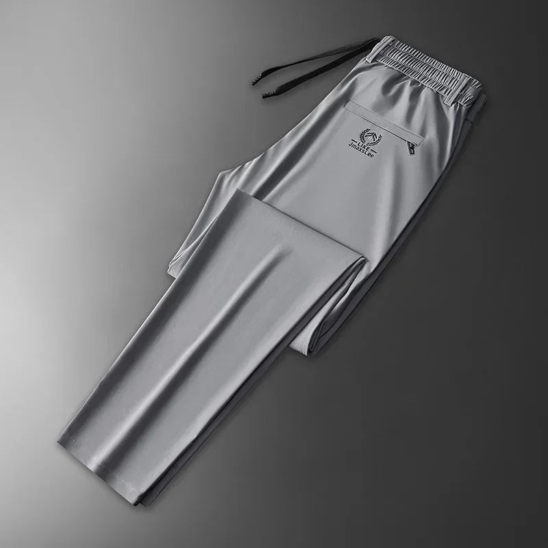 Pantalones informales finos de tela de seda de hielo suave para hombre, pantalón recto de estilo coreano, de alta elasticidad, marca de lujo, verano 2024