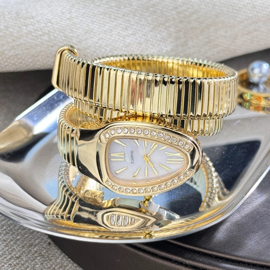 Reloj de aleación serpentina de alta calidad a la moda para mujer con caja de diamantes Reloj de pulsera de cuarzo de alta calidad estilo famoso