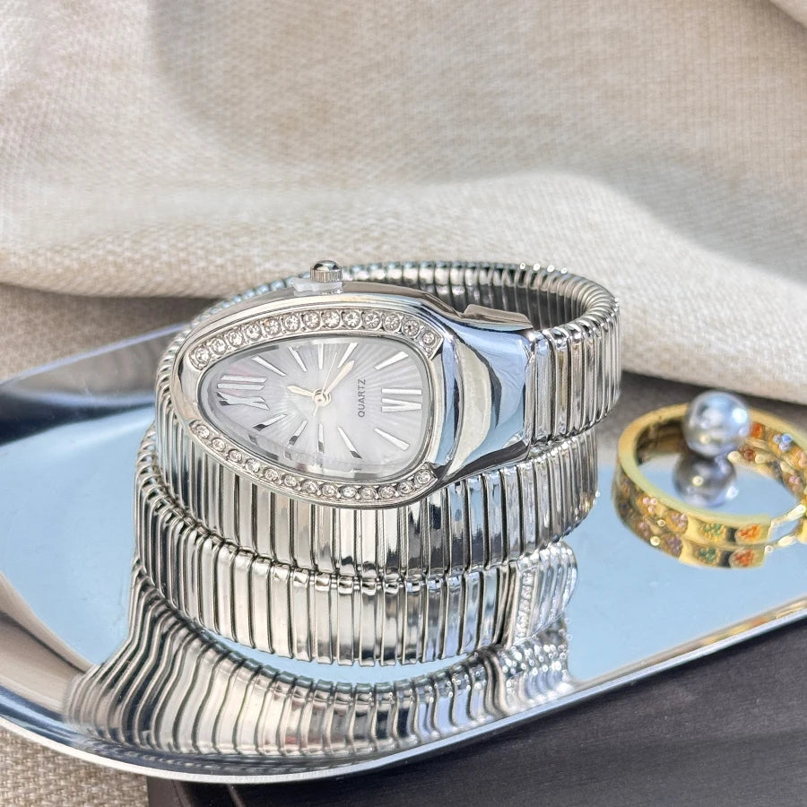 Reloj de aleación serpentina de alta calidad a la moda para mujer con caja de diamantes Reloj de pulsera de cuarzo de alta calidad estilo famoso