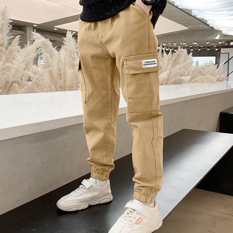 Primavera otoño niños moda guapo pantalones Cargo niños carta deportes pantalones adolescentes Casual pantalones de chándal finos 4-12 años