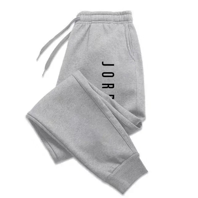 Pantalones de chándal para correr para hombres y mujeres, pantalones de chándal versátiles, ropa informal, nueva moda novedosa para las cuatro estaciones