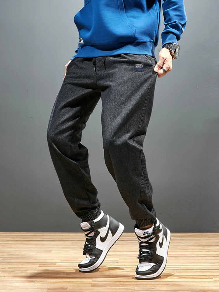 Pantalones vaqueros para correr de talla grande para hombre, ropa de calle 6XL 7XL 8XL, pantalones Cargo de mezclilla informales en negro y azul, pantalones vaqueros cónicos de algodón elásticos, pantalones holgados