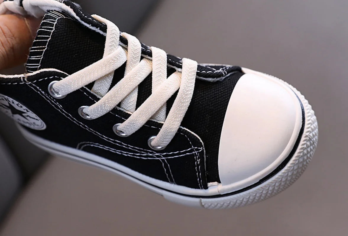 Zapatos de lona de caña media para niños, zapatos informales cómodos de fondo suave para niños y niñas, zapatos de tablero transpirables antideslizantes