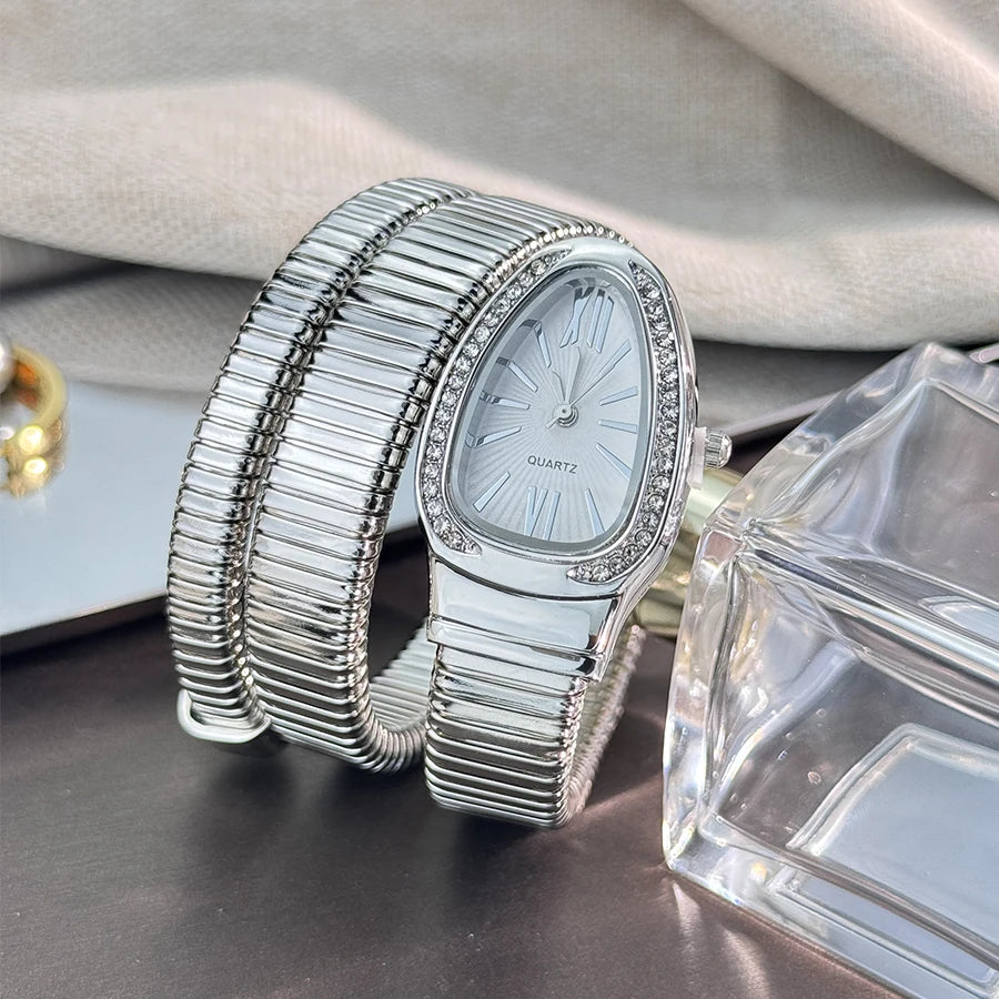 Reloj de aleación serpentina de alta calidad a la moda para mujer con caja de diamantes Reloj de pulsera de cuarzo de alta calidad estilo famoso