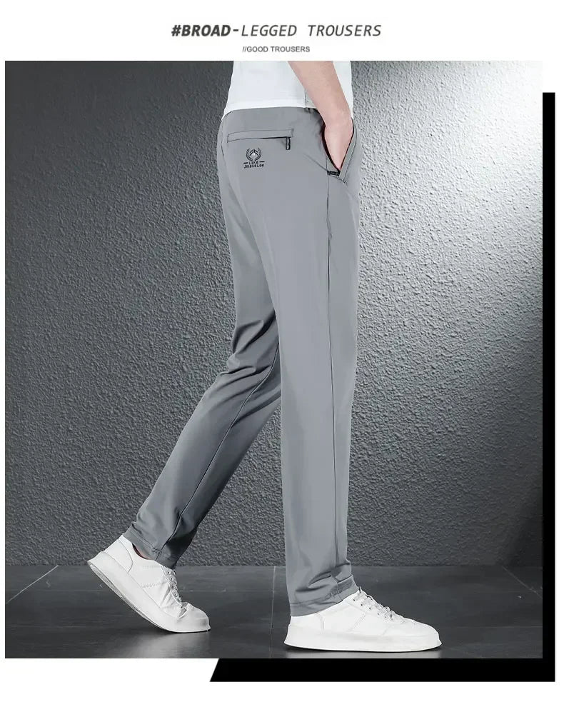 Pantalones informales finos de tela de seda de hielo suave para hombre, pantalón recto de estilo coreano, de alta elasticidad, marca de lujo, verano 2024