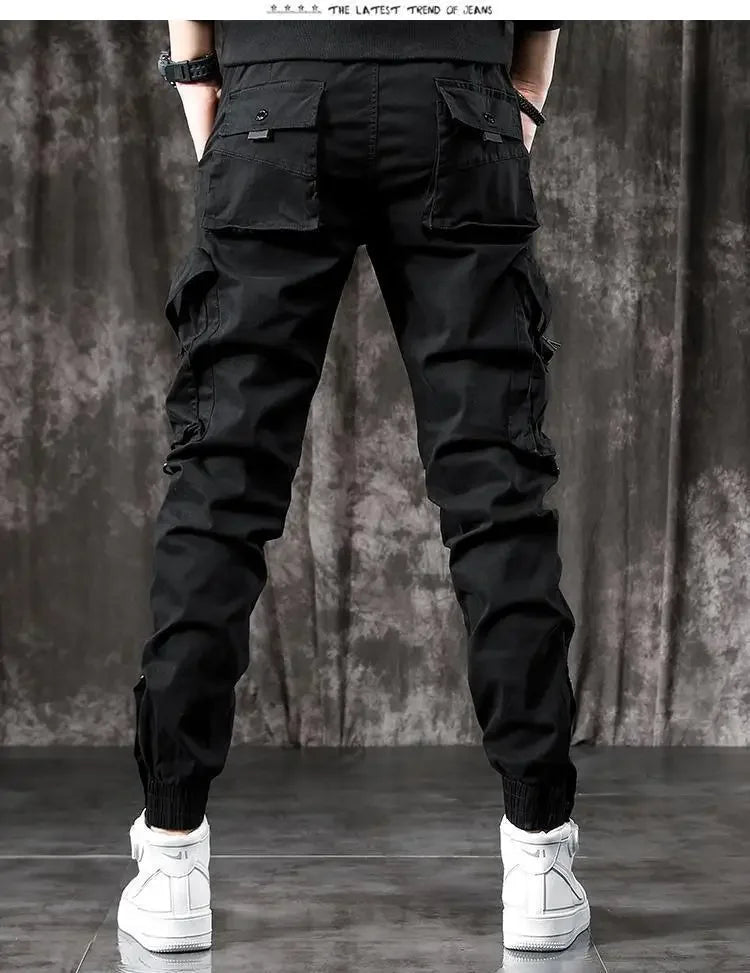 Pantalones Cargo de moda para hombre, pantalones ajustados de estilo informal, holgados, estilo americano, pantalones de pie pequeños con múltiples bolsillos, color negro, primavera y otoño