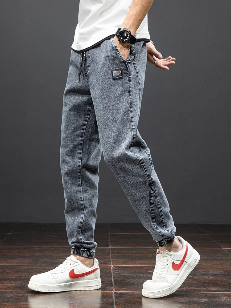 Primavera Verano negro azul Cargo Jeans hombres ropa de calle Denim Jogger pantalones hombres holgados Harem Jean pantalones de talla grande