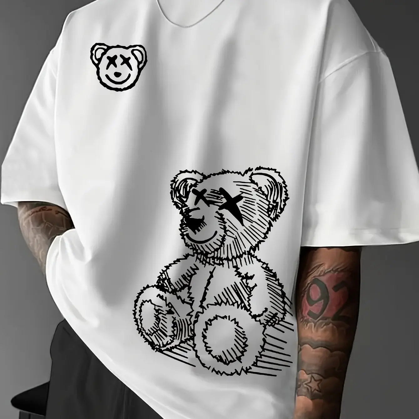Camiseta deportiva informal de algodón puro 100% para hombre, camiseta holgada y a la moda con estampado de oso de dibujos animados, cuello redondo, manga corta, verano