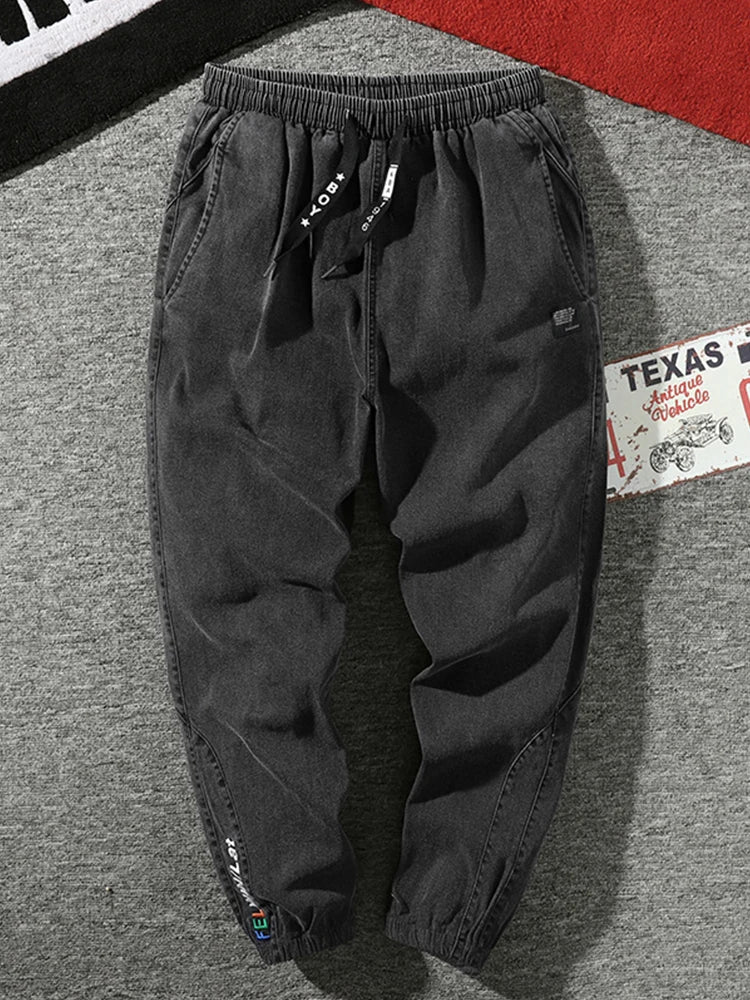 Pantalones vaqueros para correr de talla grande para hombre, ropa de calle 6XL 7XL 8XL, pantalones Cargo de mezclilla informales en negro y azul, pantalones vaqueros cónicos de algodón elásticos, pantalones holgados